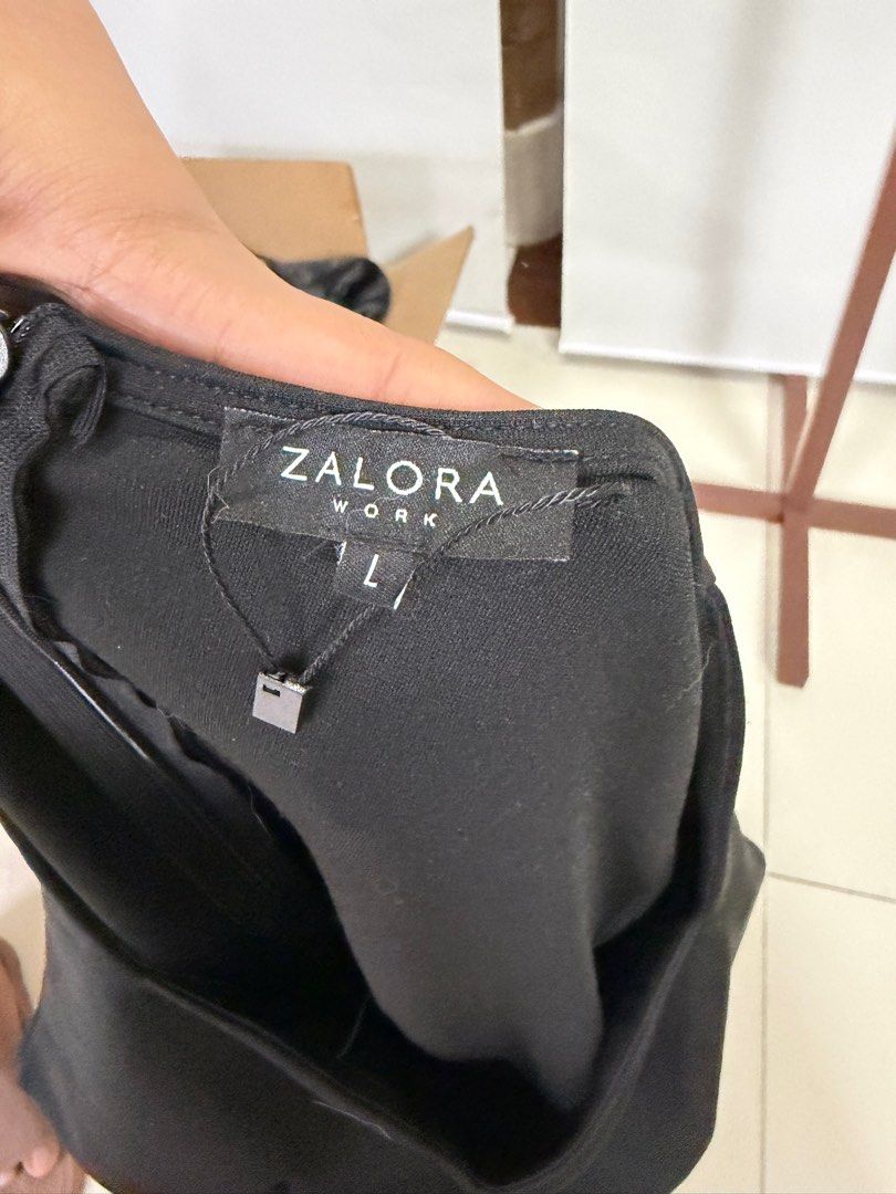Zalora Work Black Dress - Size L (Category: Dresses) located in San Juan City. Submitted by bokisy (Listing ID 1405661713, Image 2). Description: - Zalora Work black dress - Size: L - Features a square neckline - Short, puffed sleeves - Fitted silhouette - Back zipper closure - Ideal for work or formal occasions.