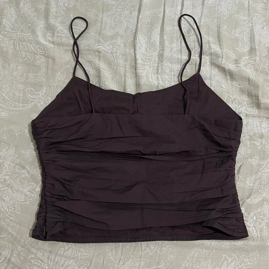 Zara Brown Ruffled Top (Category: Sleeveless) located in Quezon City. Submitted by p0lingkit (Listing ID 1405595168, Image 3). Description: 🔸 Last price na po 🔸Never worn, fit lang (no when worn as well kasi mahaba yung strap for me but adjust it however you like) 🔸See photos for dimension 🔸Brown color 🔸Size M 🔸Secret zipper so sakto lang fit 🔸Rfs: decluttering + funds to feed pets 🥹.