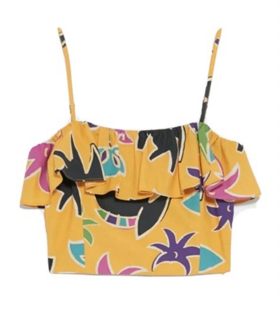 Zara Printed Floral Ruffle Crop Top (Category: Sleeveless) located in Batangas. Submitted by _azalea (Listing ID 1405616395, Image 1). Description: - Zara crop top - Vibrant yellow floral print - Ruffled neckline - Thin straps - Size M - Original price: €19.95 - Unique design - Perfect for a summery look ⛔️No rush shipping ⛔️No return/exchange.