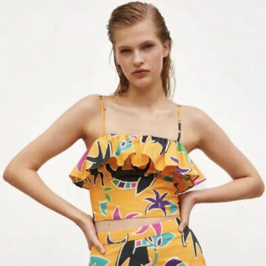 Zara Printed Floral Ruffle Crop Top (Category: Sleeveless) located in Batangas. Submitted by _azalea (Listing ID 1405616395, Image 2). Description: - Zara crop top - Vibrant yellow floral print - Ruffled neckline - Thin straps - Size M - Original price: €19.95 - Unique design - Perfect for a summery look ⛔️No rush shipping ⛔️No return/exchange.