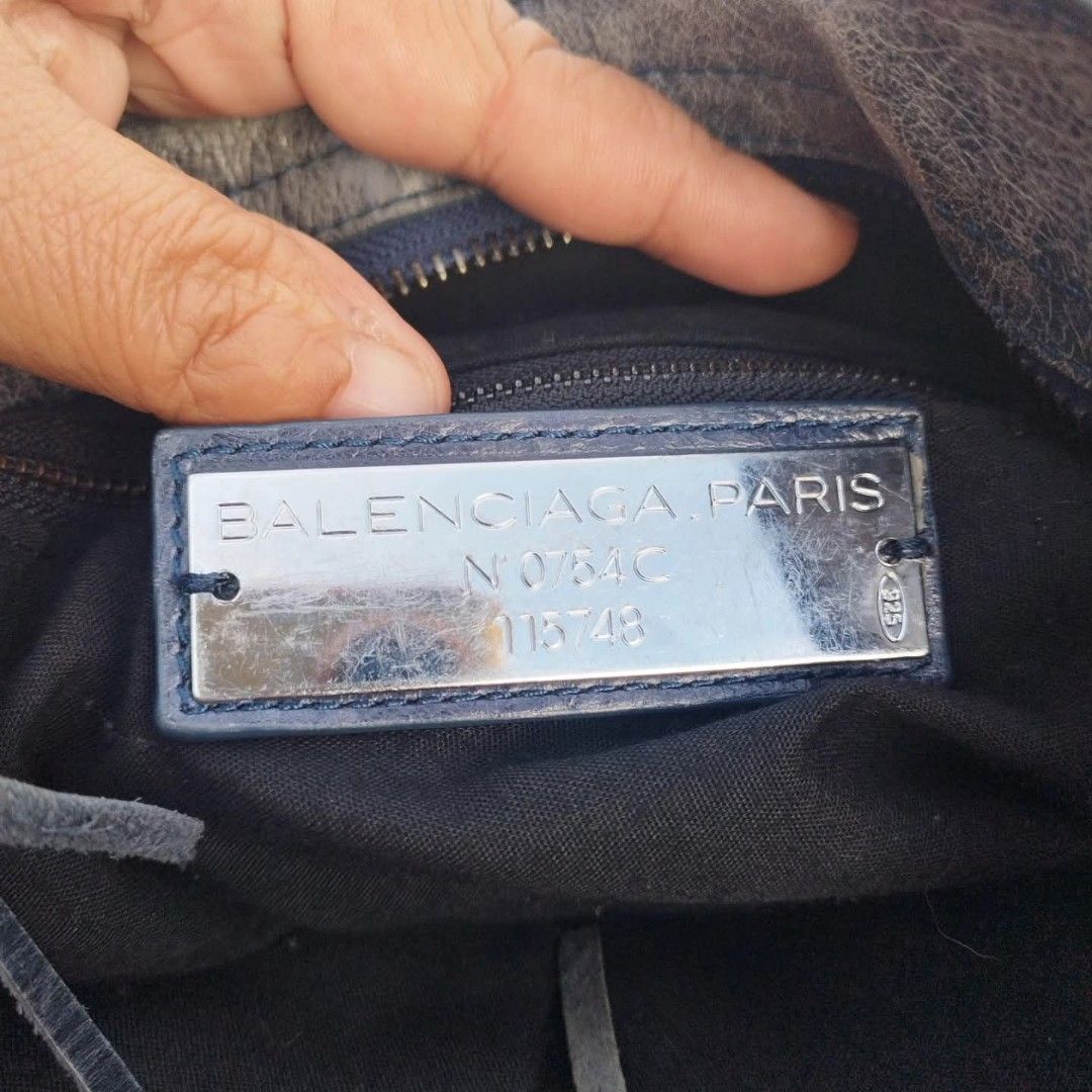 Balenciaga Classic City Handbag (Category: Luxury Bags & Wallets) located in Cebu City. Submitted by tlisurplus (Listing ID 1405835272, Image 2). Description: Balenciaga Classic City handbag - Distressed blue-grey leather - Braided top handles - Detachable shoulder strap - Multiple zip compartments - Includes dust bag - Interior zip pocket - Leather tag with brand details and serial number - Made in Italy.