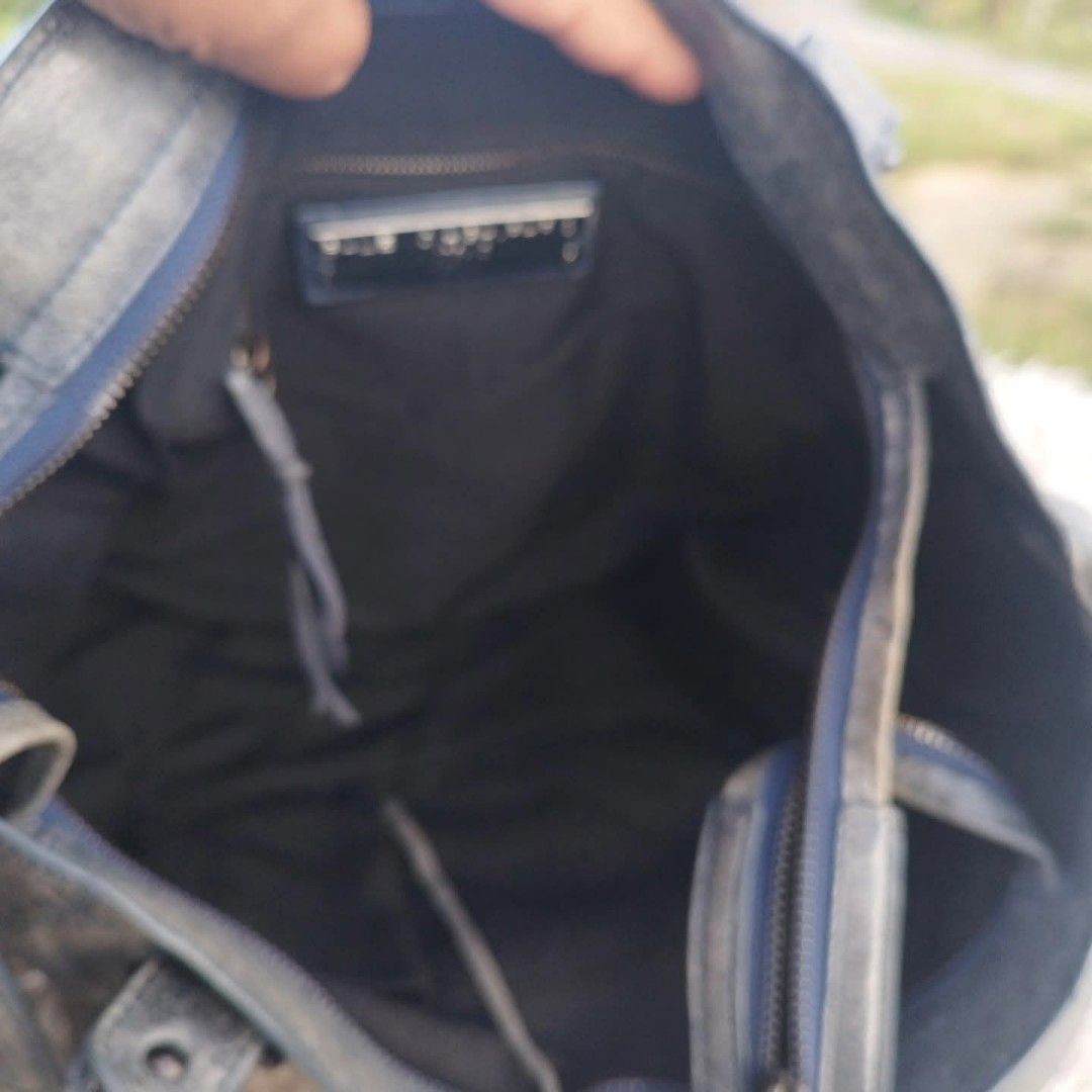 Balenciaga Classic City Handbag (Category: Luxury Bags & Wallets) located in Cebu City. Submitted by tlisurplus (Listing ID 1405835272, Image 3). Description: Balenciaga Classic City handbag - Distressed blue-grey leather - Braided top handles - Detachable shoulder strap - Multiple zip compartments - Includes dust bag - Interior zip pocket - Leather tag with brand details and serial number - Made in Italy.