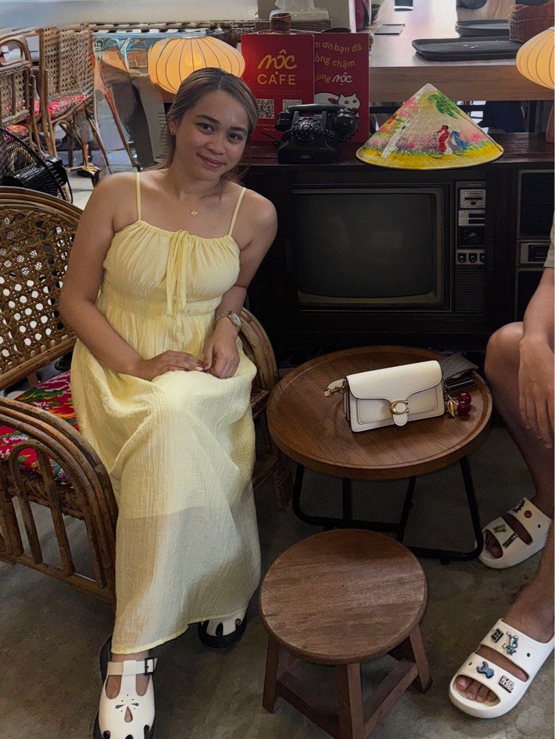 Bangkok Yellow Spaghetti Strap Dress (Category: Dresses) located in Caloocan City. Submitted by dimpsymc19 (Listing ID 1405807313, Image 2). Description: - Yellow spaghetti strap dress - Midi length - Flowing skirt - Gathered bodice with tie detail - Versatile for casual or vacation wear.