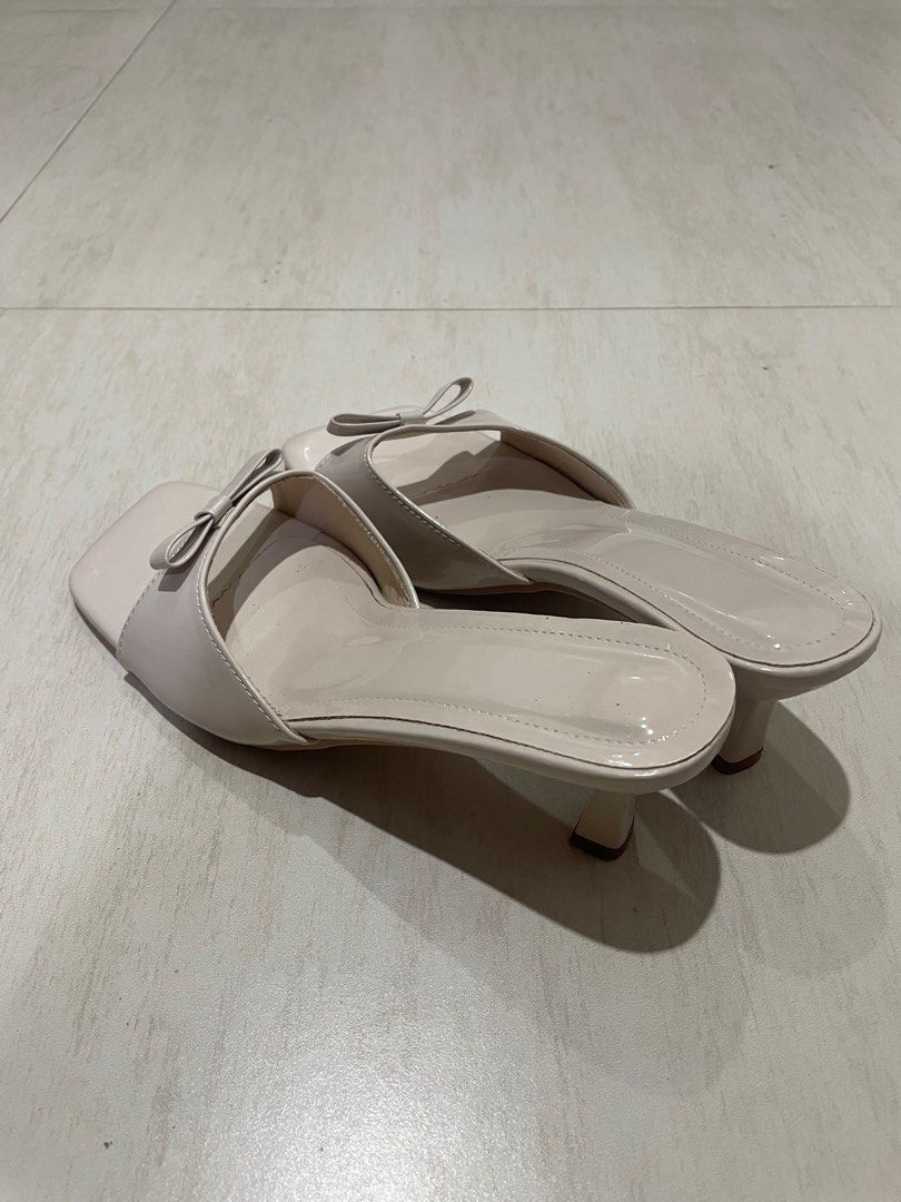 Beige Bow Heels (Category: Heels) located in Quezon. Submitted by khydeclutterz (Listing ID 1405812188, Image 3). Description: - Bought sa 🍊app for 290 - Used TWICE only ‼️ - Size 40 | 25cm | 9 - Last Price - Cleaned RFS: Decluttering.