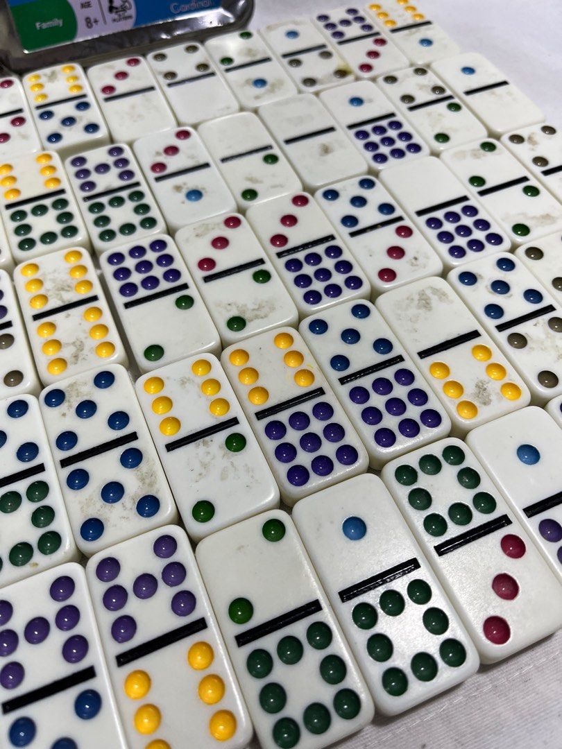 Cardinal Double Nine Color Dot Dominoes (Category: Board Games & Puzzles) located in Antipolo. Submitted by gettinghooked (Listing ID 1405712032, Image 2). Description: - Double Nine Color Dot Dominoes set - Full set with various colored dots - Comes in a metal tin for storage - Metal tin shows some wear and tear - Suitable for ages 8+ - Great for family play NOTE: - tiles need cleaning/washing; been in storage for years - dented tin can with pre