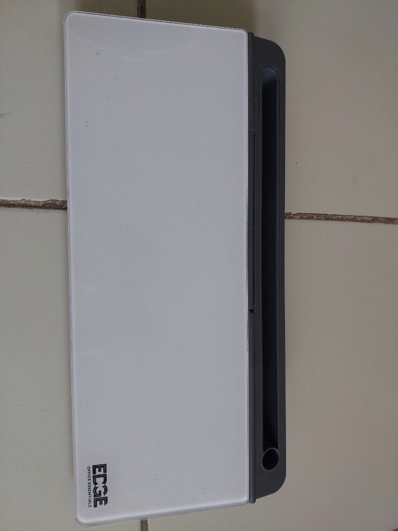 (Further discount) Unused Edge Office Essentials Whiteboard with Accessories (Category: Office Furniture & Fixtures) located in Mandaluyong City. Submitted by declutterwithkinah (Listing ID 1405754267, Image 1). Description: - Edge Office Essentials whiteboard - Built-in tray for markers and eraser - Includes 2 markers and an eraser - Whiteboard with gray trim - Compact and portable design - Ideal for quick notes and reminders.