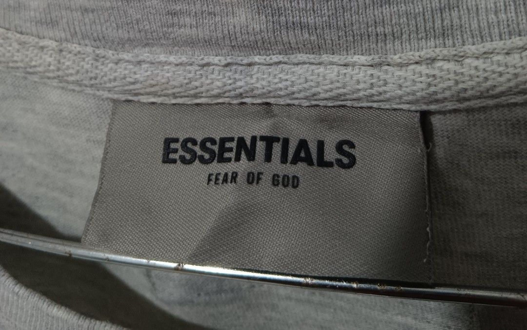 Essentials Fear of God Gray T-shirt XL (Category: Tshirts & Polo Shirts ) located in Dauis. Submitted by udenglegaspi (Listing ID 1405903911, Image 3). Description: - Fear of God Essentials T-shirt - Color: Gray - Size: XL - Features Essentials logo - Material: 100% Cotton - Fit: Relaxed - Sleeves: Short - Made in Vietnam.