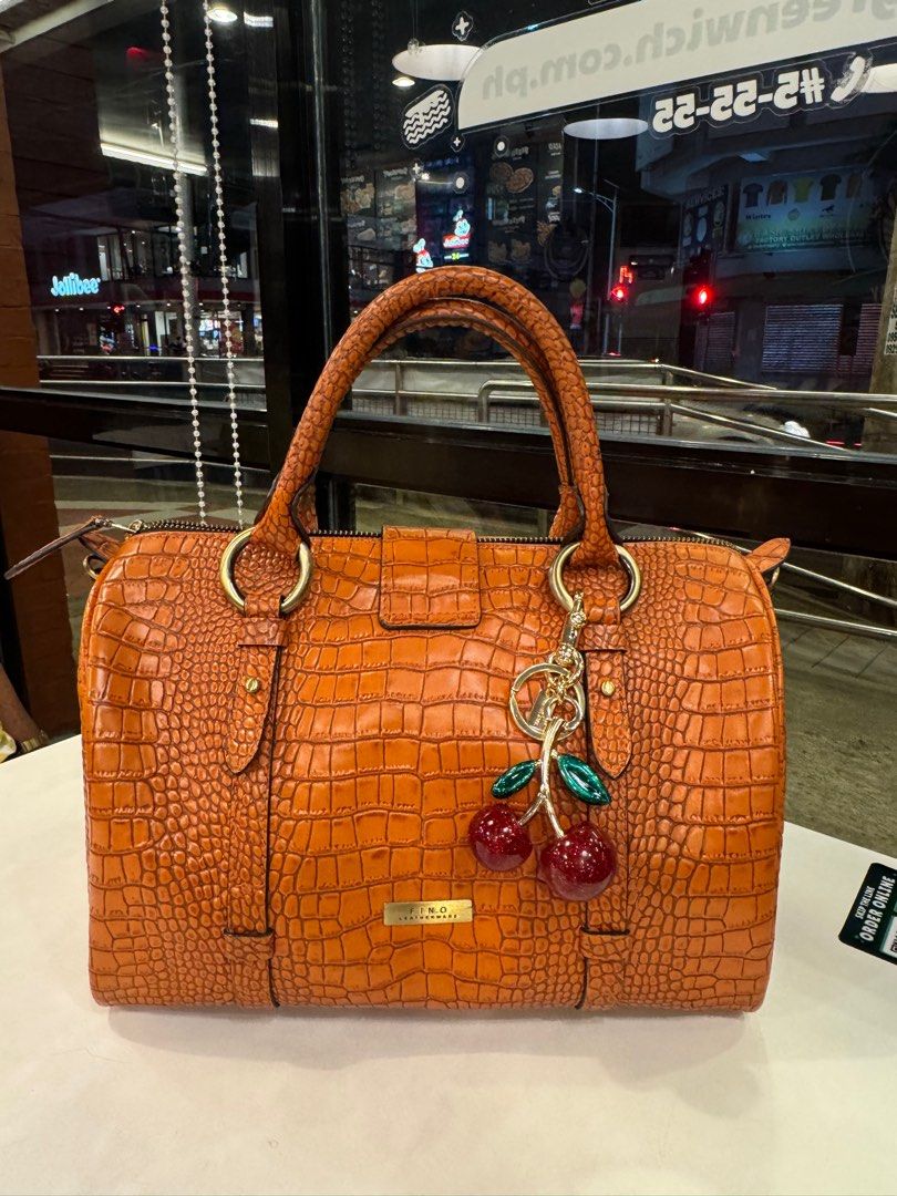 FINO Crocodile-Embossed Handbag (Category: Luxury Bags & Wallets) located in Ozamiz City. Submitted by Maney8 (Listing ID 1405901304, Image 1). Description: With sling strap In excellent condition LP posted #fino #finoleatherware.
