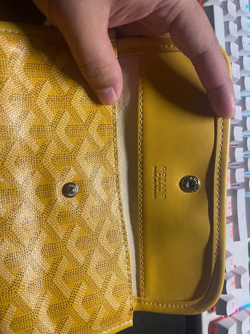 Goyard Paris long Wallet (Category: Luxury Bags & Wallets) located in Manila. Submitted by rojanorial01659 (Listing ID 1405906430, Image 3). Description: - Authentic Goyard Paris card holder - Signature yellow Goyardine canvas - Snap closure - Ring detail on the back - Interior compartment with snap closure - Made in France.