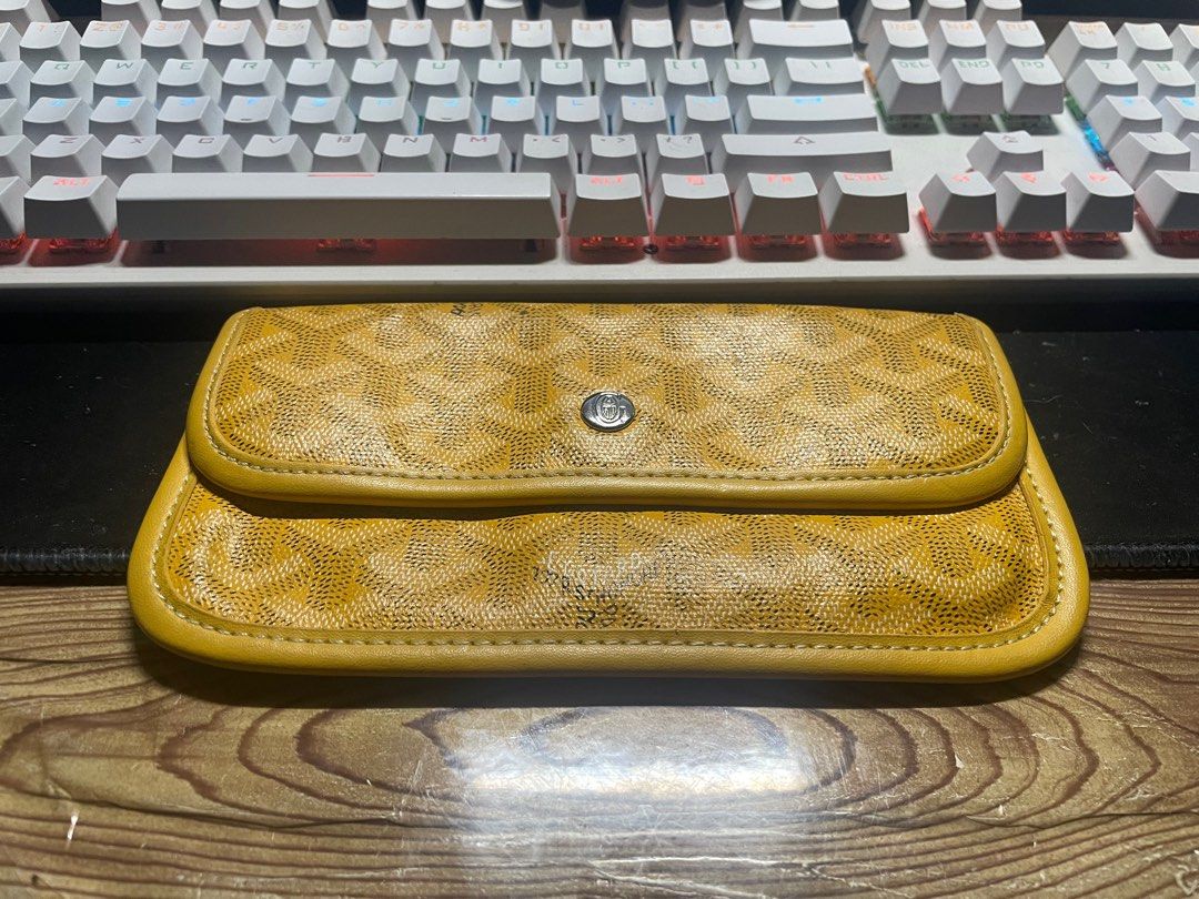 Goyard Paris long Wallet (Category: Luxury Bags & Wallets) located in Manila. Submitted by rojanorial01659 (Listing ID 1405906430, Image 1). Description: - Authentic Goyard Paris card holder - Signature yellow Goyardine canvas - Snap closure - Ring detail on the back - Interior compartment with snap closure - Made in France.