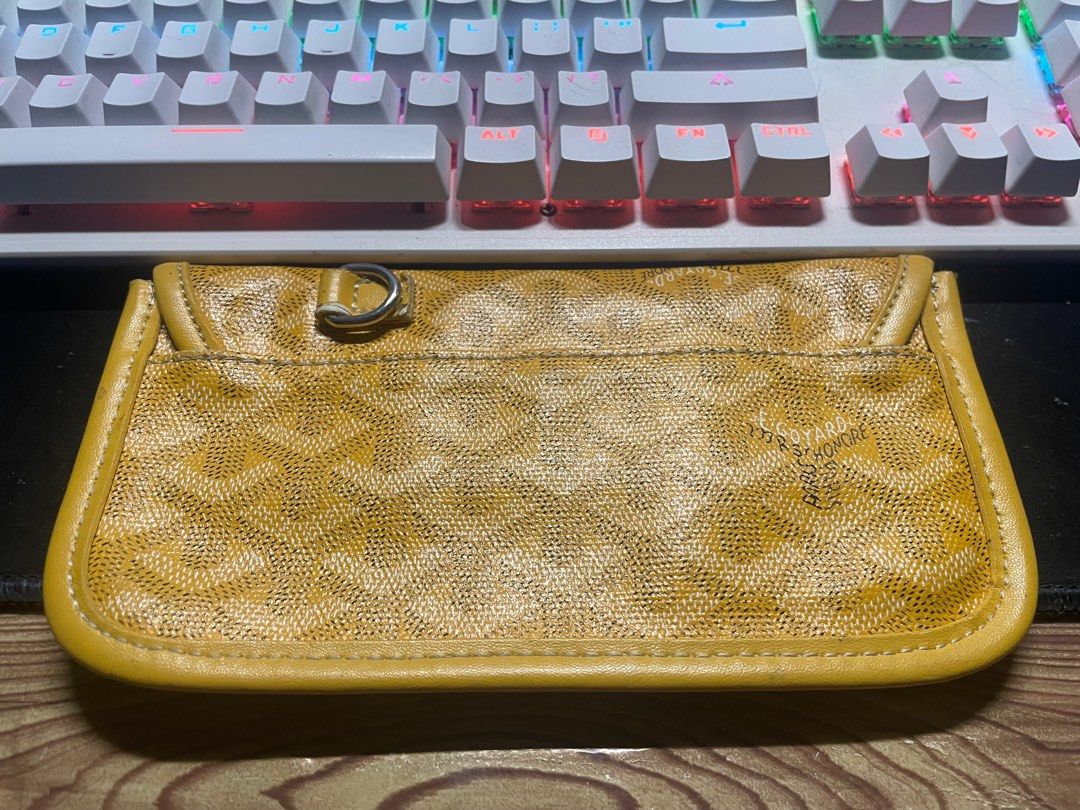 Goyard Paris long Wallet (Category: Luxury Bags & Wallets) located in Manila. Submitted by rojanorial01659 (Listing ID 1405906430, Image 2). Description: - Authentic Goyard Paris card holder - Signature yellow Goyardine canvas - Snap closure - Ring detail on the back - Interior compartment with snap closure - Made in France.