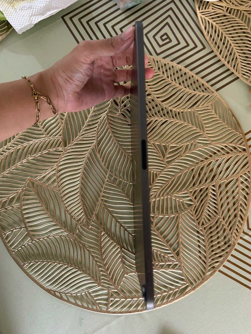 iPad Air 5th gen 64GB (Category: iPad) located in Binan City. Submitted by meraki_joylaaaaa (Listing ID 1405735288, Image 3). Description: - iPad Air 5th gen - 64GB storage - Minor flaw (small dent on the corner) - Tempered Glass installed - Box (Signs of usage natambak) - With Unused Braided Charger - Chip Processor: M1 - Slightly negotiable - Meet-up only.