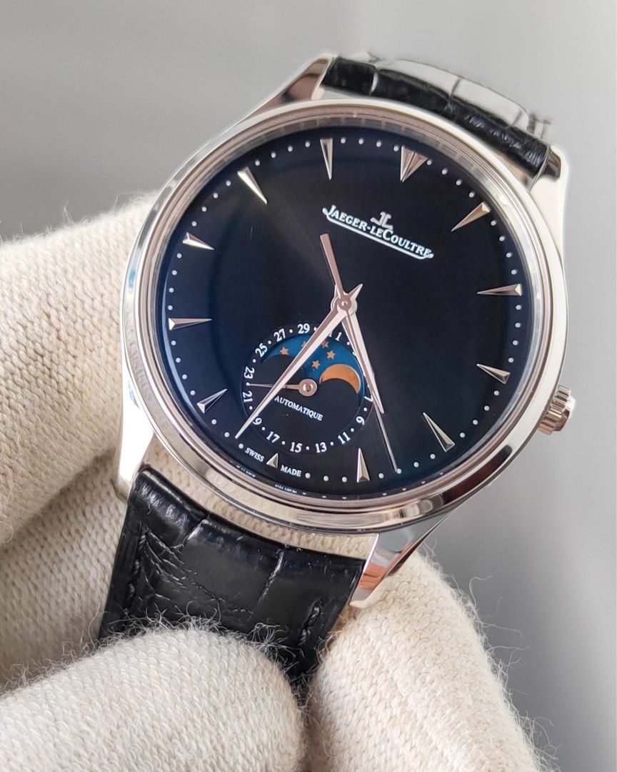 Jaeger-LeCoultre Master Ultra Thin Moon 39 (Category: Luxury Watches) located in Manila. Submitted by kristinepenafiel (Listing ID 1405900679, Image 1). Description: - Jaeger-LeCoultre Master Ultra Thin Moon 39 - Black dial with moon phase indicator - Automatic movement - Stainless steel case - Leather strap with deployment clasp - Includes original box and papers - Showcases intricate movement on the back.