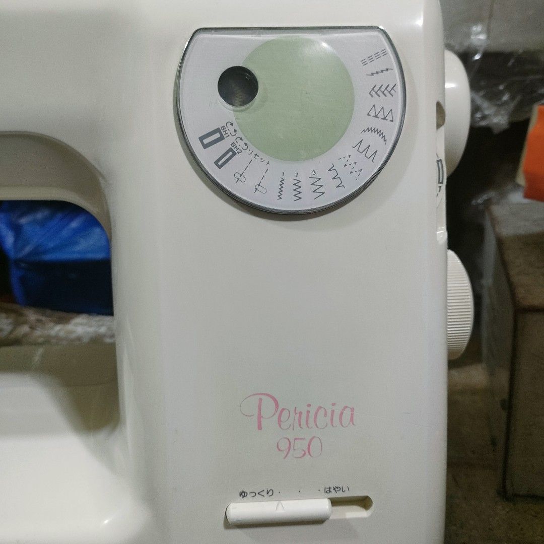 Janome Pericia 950 Sewing Machine (Category: Craft Supplies & Tools) located in Manila. Submitted by faststone-c3c8 (Listing ID 1405783916, Image 3). Description: - Janome Pericia 950 sewing machine - Variety of stitch patterns - Speed control slider - Built-in light - White body with pink lettering - Dial for stitch selection - In good working condition.