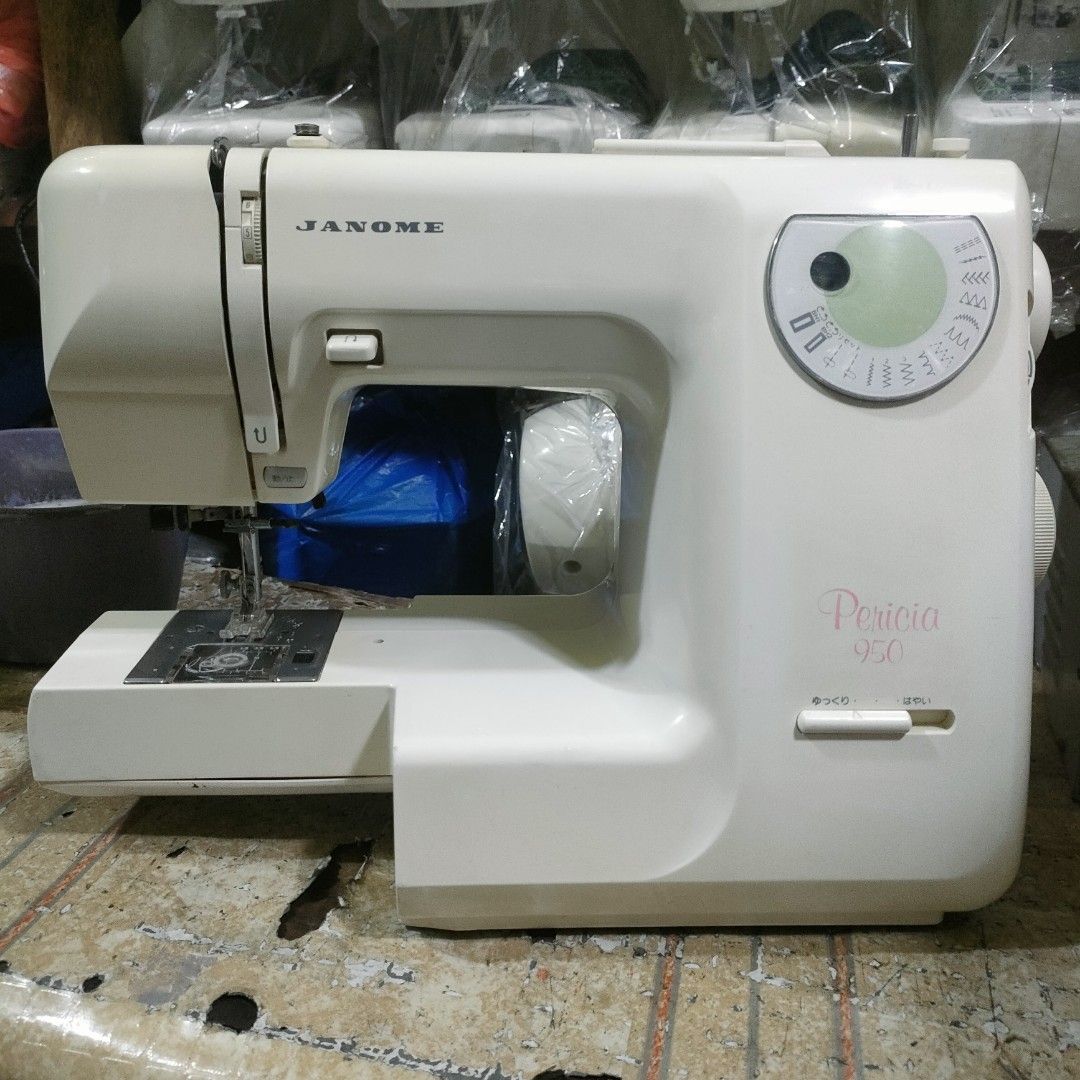 Janome Pericia 950 Sewing Machine (Category: Craft Supplies & Tools) located in Manila. Submitted by faststone-c3c8 (Listing ID 1405783916, Image 1). Description: - Janome Pericia 950 sewing machine - Variety of stitch patterns - Speed control slider - Built-in light - White body with pink lettering - Dial for stitch selection - In good working condition.