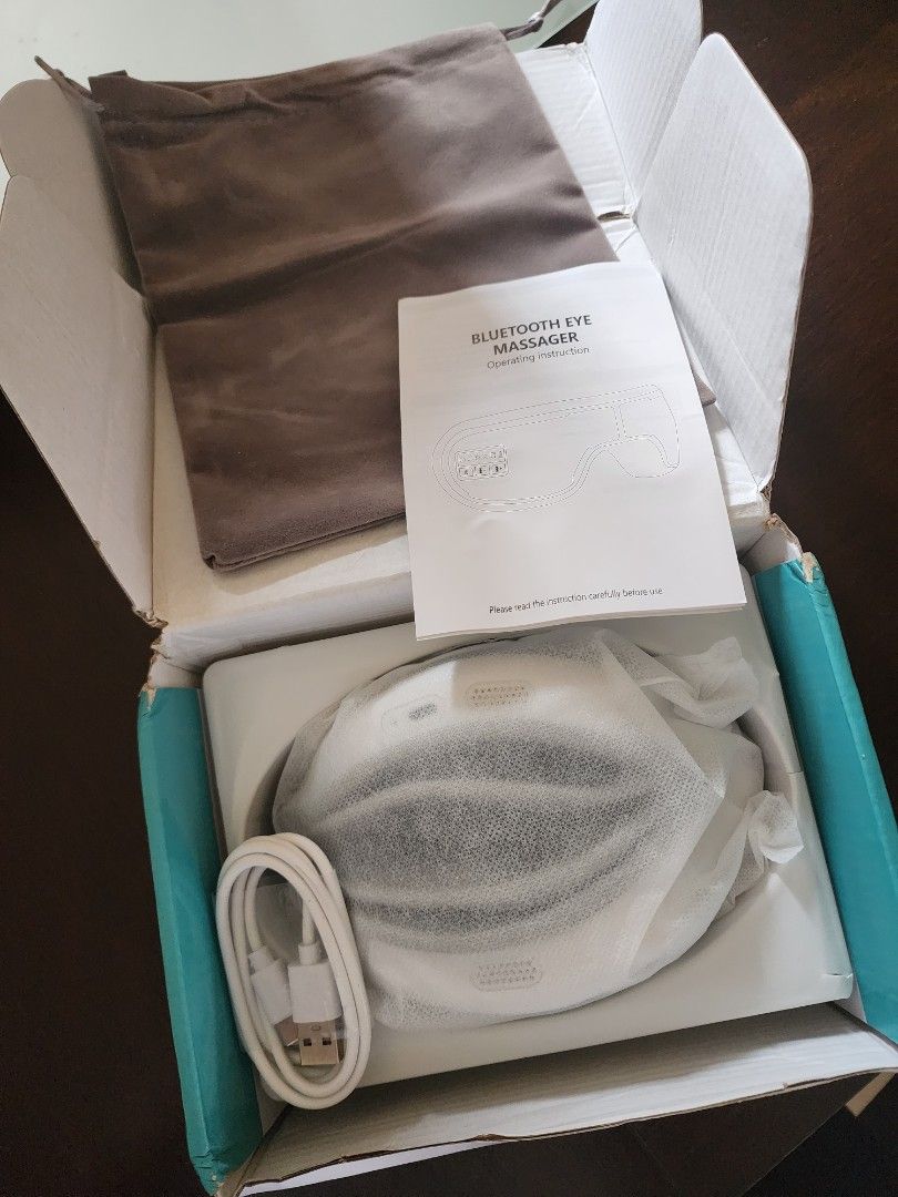 JidiTech Eye Care Portable Eye Massager (Category: Face Care) located in Calamba. Submitted by minabubu (Listing ID 1405717304, Image 2). Description: RFS: found another gift for our secret santa - Unused condition - Includes original box, manual, charging cable, and carrying pouch - Stylish white and gray design - Bluetooth enabled - Designed for eye care and relaxation.