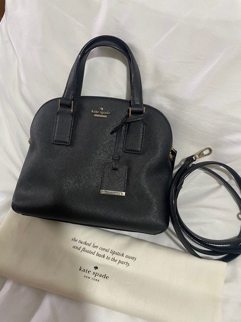Kate Spade Black Dome Satchel Bag (Category: Luxury Bags & Wallets) located in Manila. Submitted by chagubs (Listing ID 1405778290, Image 1). Description: ✨ Kate Spade Black Saffiano Leather Dome Satchel ✨ Letting go of this gorgeous Kate Spade bag, gifted to me back in 2022. ✔️ Leather is in very good condition — no visible scratches ✔️ Used only 4–5 times ✔️ Comes with adjustable leather strap (can be worn as a crossbody) ✔️ Includes the origin