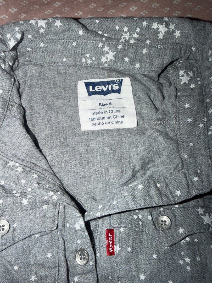 Levi's Star Print Dress - Size 6 (Category: Babies & Kids Fashion) located in Tacloban City. Submitted by chaomg (Listing ID 1405877561, Image 2). Description: - Levi's dress - Star print - Size 6 - Button-down style - Cinched waist - Long sleeves - Collar MOP: GCash/Maya Payment (last price posted).