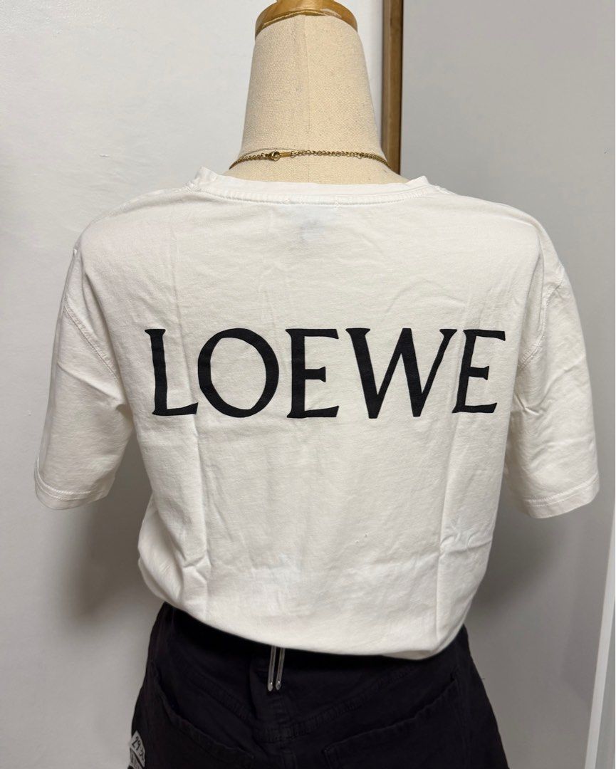 Loewe Dumbo Womens T-shirt (Category: Shirts) located in Cabuyao City. Submitted by ysa.finds (Listing ID 1405841881, Image 1). Description: - Loewe Womens T-shirt - Fits Womens Medium - Dumbo design - Logo at the back - Pls bote: Authenticity is not guaranteed, item was thrifted.