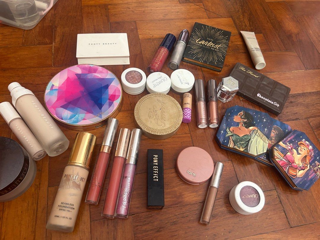 Makeup clearance bundle (Category: Makeup) located in Singapore. Submitted by violet.staycations (Listing ID 1405740745, Image 1). Description: Fenty pro filt’r foundation and concealer, all-over metallic powder raspberry rave Tarte make believe in yourself palette Fenty blotting powder in universal Tarte shape tape concealer, amazonian clay blush, tartiest pro glow to go palette Colourpop super shock shadow, jelly pop shadow, ultra glossy lip, D