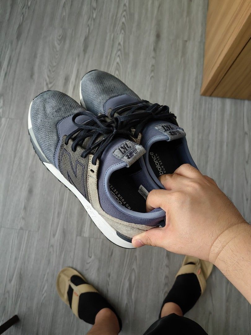 New Balance 247 Sneakers (Category: Sneakers) located in Pasig City. Submitted by don.rodriguez (Listing ID 1405788579, Image 2). Description: - New Balance 247 sneakers (I think this is a limited release) - Stylish blue and grey colorway - REVlite midsole for comfort - Rarely used - Well taken cared off Honest Issue - Since I used this twice only, it spent more time in the shoe rack than anywhere else, eventually, there came the sole separation 