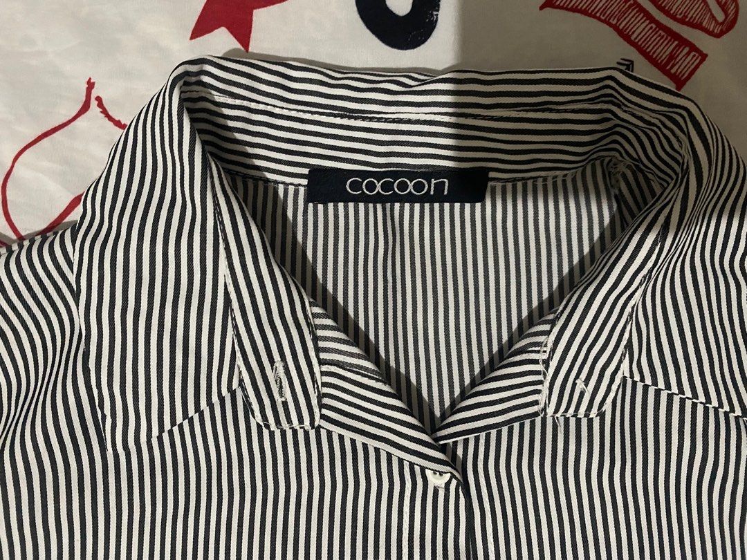 New Cocoon Striped Blouse with Embroidery (Category: Blouses) located in Kidapawan. Submitted by thriftfi.t (Listing ID 1405837927, Image 2). Description: - Cocoon striped blouse - Embroidered hemline - Short sleeves - Collared neckline - Button-down - Lightweight fabric - Perfect for a casual look MoP: Instapay QR code (to be send by the seller) No COD No cancellations or bogus buyers.