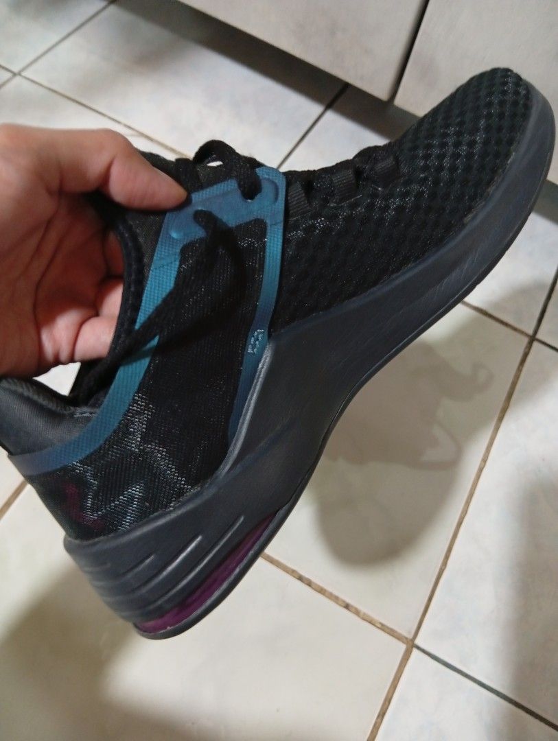Nike Womens Air Max Bella TR 2 AMD Black (Category: Sneakers) located in Manila. Submitted by bb_mushroom (Listing ID 1405769282, Image 2). Description: Nike Womens Air Max Bella TR 2 AMD Black - Color: Black with teal accents - Size: US 8.5, UK 6, EUR 40 - Features: Black mesh upper, teal Nike swoosh - Sole: Black with purple accent - Brand new - Authentic - Good Condition - No box .