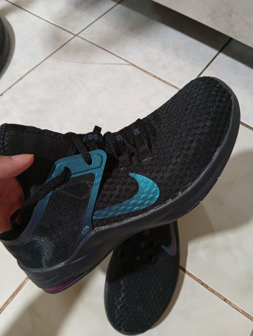 Nike Womens Air Max Bella TR 2 AMD Black (Category: Sneakers) located in Manila. Submitted by bb_mushroom (Listing ID 1405769282, Image 3). Description: Nike Womens Air Max Bella TR 2 AMD Black - Color: Black with teal accents - Size: US 8.5, UK 6, EUR 40 - Features: Black mesh upper, teal Nike swoosh - Sole: Black with purple accent - Brand new - Authentic - Good Condition - No box .