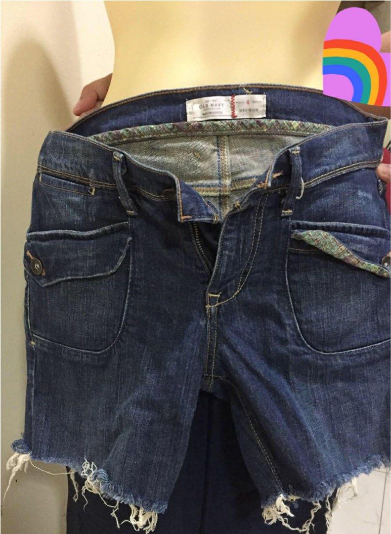 Old Navy Denim Shorts (Category: Shorts) located in Quezon City. Submitted by mdmshops (Listing ID 1405739371, Image 2). Description: - Old Navy denim shorts - Dark blue wash - Frayed hem - Two front pockets - Two back pockets - Button and zipper closure - Size tag visible.