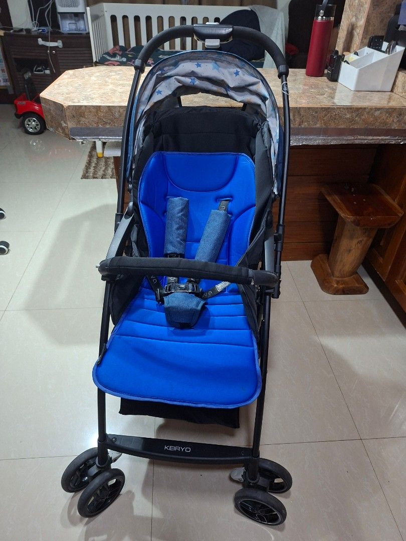 Preloved Apruva Keryo Stroller - Blue (Category: Strollers) located in Taytay. Submitted by goodybelmonte (Listing ID 1405853377, Image 1). Description: - Blue stroller with matching canopy - Black frame - Four wheels - Safety harness included - Features a storage compartment - Comes with a mosquito net .