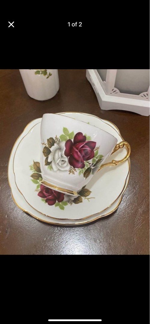 Royal Imperial Floral Triop (Category: Coffee & Tea Tableware) located in Las Pinas. Submitted by missa0321 (Listing ID 1405725022, Image 1). Description: - Vintage teacup and saucer set - Features a beautiful floral design with red and white roses - Elegant gold handle and trim - Includes one teacup, one saucer and tea plate (Trio) - Perfect for tea or display.
