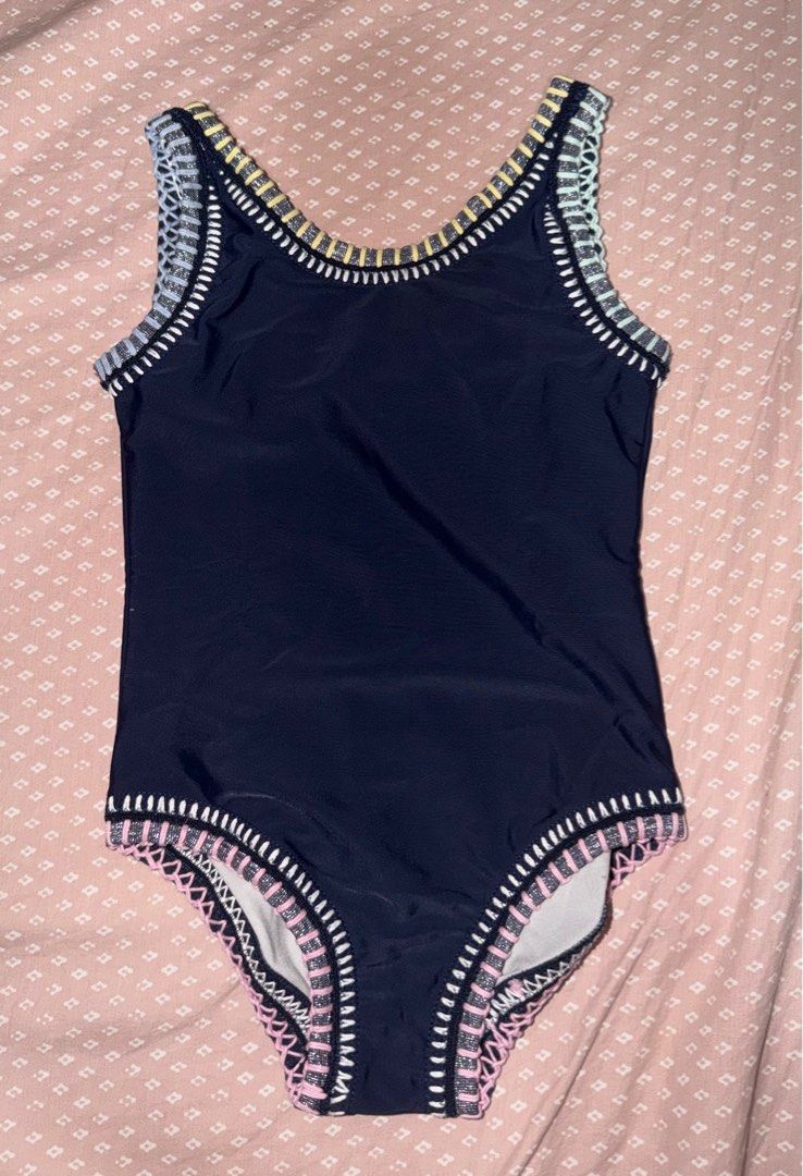 Seed Heritage Swimsuit Size 6 (Category: Babies & Kids Fashion) located in Tacloban City. Submitted by chaomg (Listing ID 1405877558, Image 1). Description: - Seed Heritage one-piece swimsuit - Color: Navy blue - Size: 6 - Decorative stitching in white, yellow, and pink - Smooth, solid fabric - Light grey inner lining MOP: GCash/Maya Payment (last price posted).