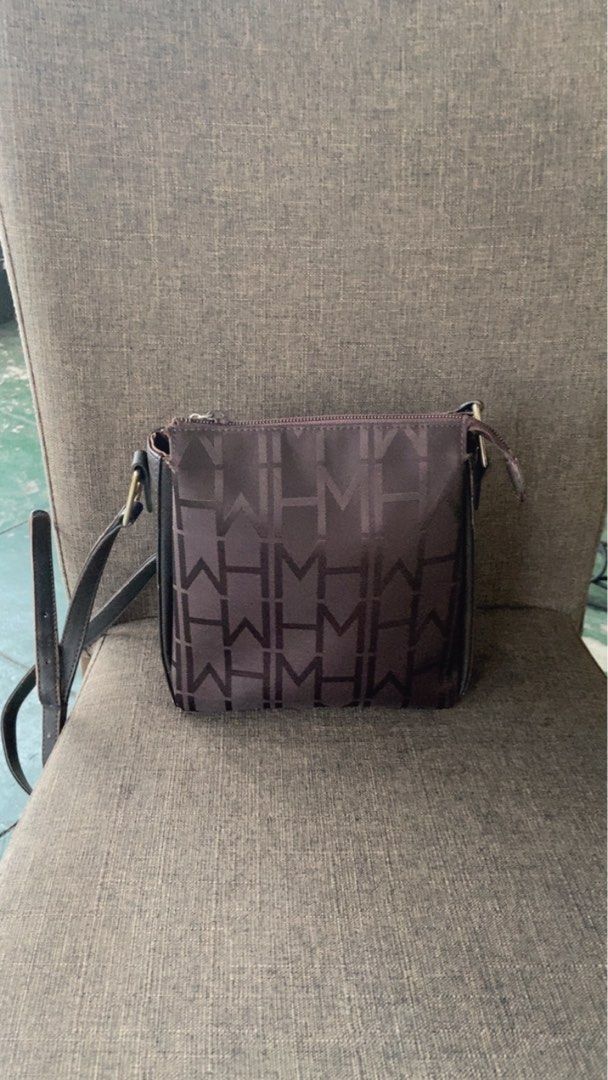 Shoulder Bag with Monogram (Category: Luxury Bags & Wallets) located in Pasig City. Submitted by cesskieaah (Listing ID 1405814060, Image 1). Description: - Monogram pattern - Main zippered compartment - Exterior zippered pocket - Adjustable long strap - Dark-colored fabric - Suitable for everyday use.