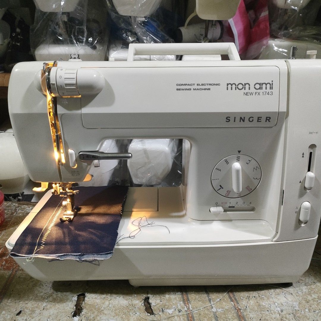 Singer Mon Ami New FX 1743 Sewing Machine (Category: Craft Supplies & Tools) located in Manila. Submitted by faststone-c3c8 (Listing ID 1405786332, Image 3). Description: Singer Mon Ami New FX 1743 compact electronic sewing machine. Features a variety of stitch patterns and speed control. Includes a built-in light for enhanced visibility..