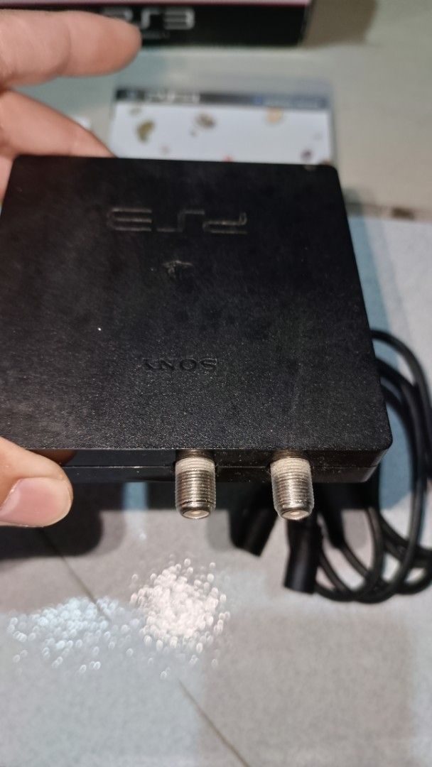 Sony PS3 Torne Digital Recorder Kit PS3 accessory (Category: Soundbars, Speakers & Amplifiers) located in Caloocan City. Submitted by toywarsph (Listing ID 1405711518, Image 3). Description: Listing is for a Sony PS3 Torne digital recorder kit. It includes the Torne tuner, a disc, manuals, and the original box. The tuner has two input ports and a power cable. The box shows the Torne logo and the PS3 logo. The disc is labeled "torne" and "PS3"..