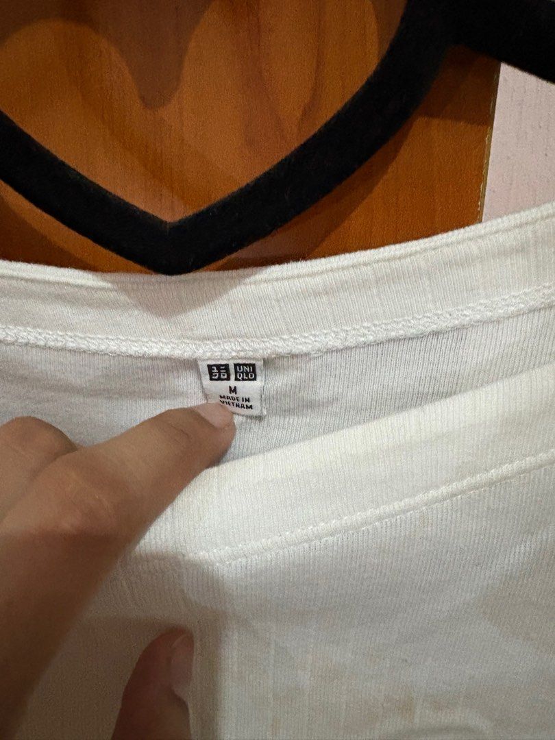 Uniqlo ribbed top (Category: Blouses) located in Subic. Submitted by lenhub (Listing ID 1405849641, Image 2). Description: With removable stain.