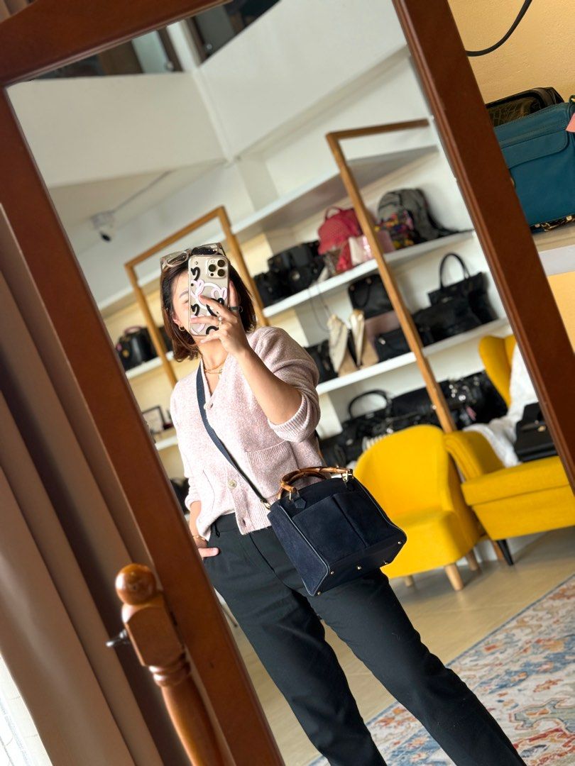 Vintage Gucci Mini Suede Bamboo Bag (Category: Luxury Bags & Wallets) located in Baguio. Submitted by asna_taku (Listing ID 1405836617, Image 3). Description: Vintage Gucci orig mini/small two way suede leather with bamboo handle Dark blue color Open for LA Gold pa hardware ₱15K.