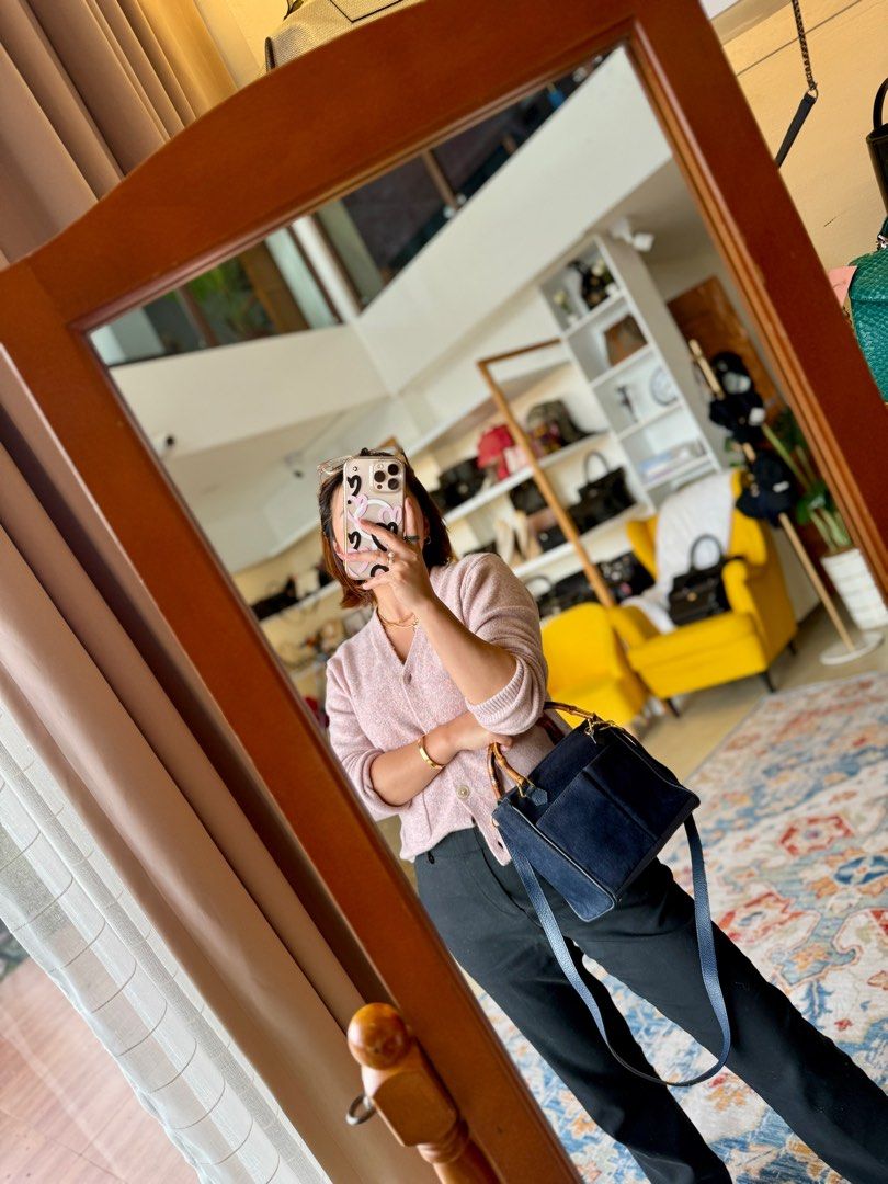 Vintage Gucci Mini Suede Bamboo Bag (Category: Luxury Bags & Wallets) located in Baguio. Submitted by asna_taku (Listing ID 1405836617, Image 2). Description: Vintage Gucci orig mini/small two way suede leather with bamboo handle Dark blue color Open for LA Gold pa hardware ₱15K.