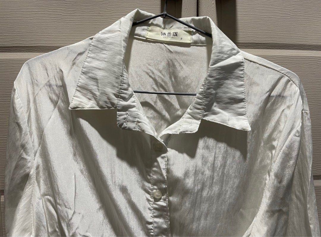 White Long Sleeves with Tie (semi-satin) (Category: Blouses) located in Pasig City. Submitted by aikasantos (Listing ID 1405843826, Image 1). Description: RFS: Decluttering Very good condition, natambak lang need wash.