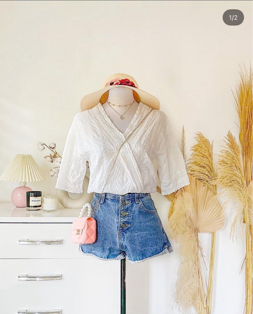 White Top (Category: Sets or Coordinates) located in Mandaluyong City. Submitted by projectsaleph (Listing ID 1405722712, Image 1). Description: - White top with V-neck and short sleeves - Ideal for casual and summer outfits.
