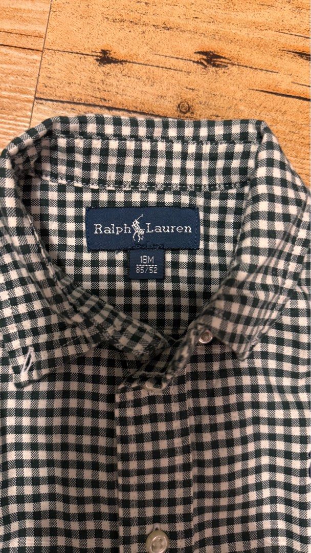 [18m] Ralph Lauren Gingham Check Shirt (Category: Babies & Kids Fashion) located in Cabuyao City. Submitted by mamamara19 (Listing ID 1406041693, Image 3). Description: Note: Can't vouch for the authenticity - it was given as a gift and was not personally bought but fabric is very good and hindi mainit (airy) - Ralph Lauren long-sleeved shirt - Classic gingham check pattern - Size: 18M - Features button-down collar - Small embroidered logo - Ligh