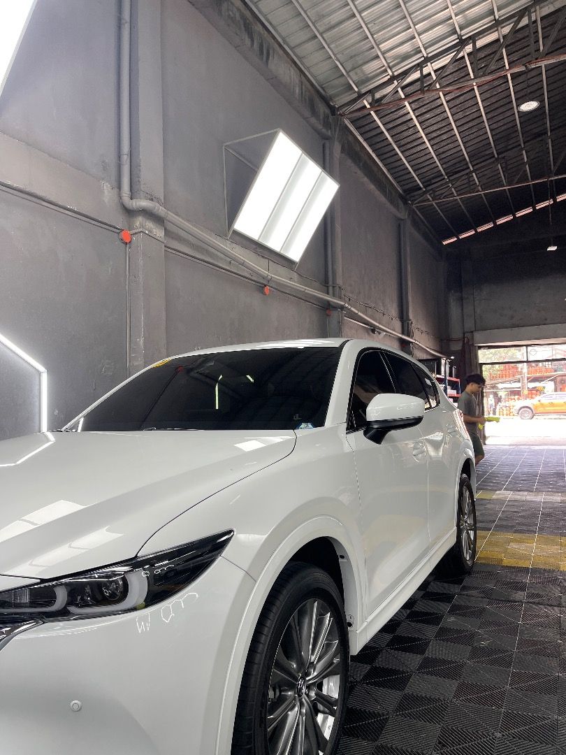 2024 Mazda CX-5 AWD Turbo (Category: Heavy Vehicles) located in Makati City. Submitted by deautotrading (Listing ID 1405941932, Image 2). Description: For sale: 2024 Mazda CX-5 AWD Turbo Gas Price: P2,000,000 Casa maintained No issues *Top of the line variant* - Rhodium White Premium - Dynamic Pressure Turbo SKYACTIV-G 2.5L - I-ACTIV All-Wheel Drive - Automatic w/ Sports Mode - G-Vectoring Control Plus - IGL Graphene Coatings (mags included) - Pu