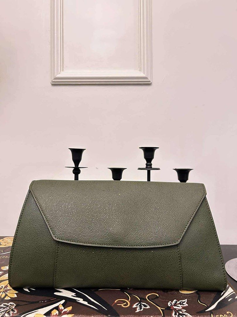 Auth. Valextra Clutch in Olive Green. (Category: Clutches) located in Cagayan de Oro. Submitted by borse_de_amore (Listing ID 1405979173, Image 2). Description: Auth. Valextra Clutch in Olive Green. Rank AB++ no Major flaws Very Minimal Signs of use Only. Clean interior/exterior. Magnetic Closure. Fits Large fones. 6,500 only shipped.