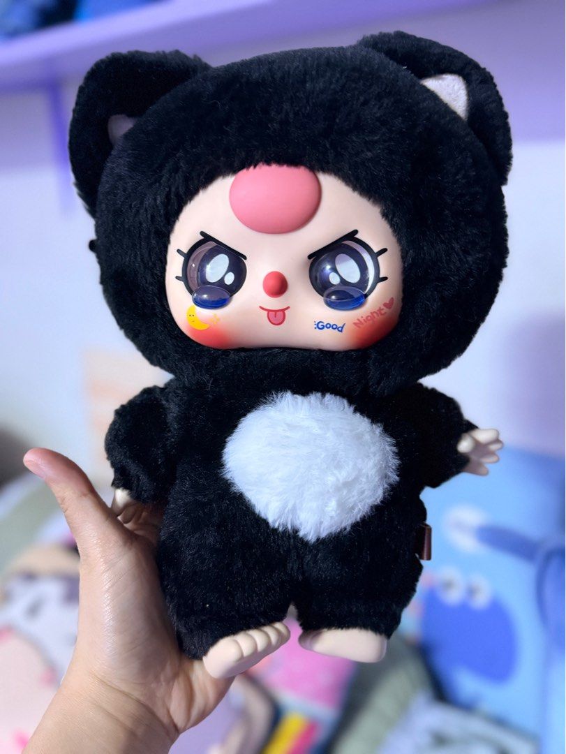 Baby Three 400 Black Cat Plush Toy (Category: Plushies & Soft Toys) located in Pasig City. Submitted by belowsrp_1729 (Listing ID 1406071865, Image 1). Description: - Unique bear plush toy - Black furry body - Cute face with expressive eyes - In a bear costume - White chest patch - Soft and huggable - Perfect for collectors or gifts Used as display only Crying eyes Authentic.