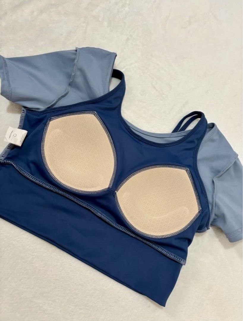 Blue Sports Bra/Top with Built-in Padding (Category: Activewear) located in Manila. Submitted by mailed (Listing ID 1406031092, Image 2). Description: - Stylish blue sports bra - Built-in inner layer for support - Scoop neckline and short sleeves - Includes padding for coverage - Buttery - good for yoga/workout.