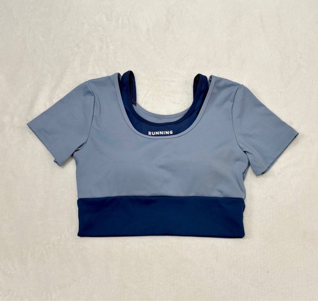 Blue Sports Bra/Top with Built-in Padding (Category: Activewear) located in Manila. Submitted by mailed (Listing ID 1406031092, Image 1). Description: - Stylish blue sports bra - Built-in inner layer for support - Scoop neckline and short sleeves - Includes padding for coverage - Buttery - good for yoga/workout.