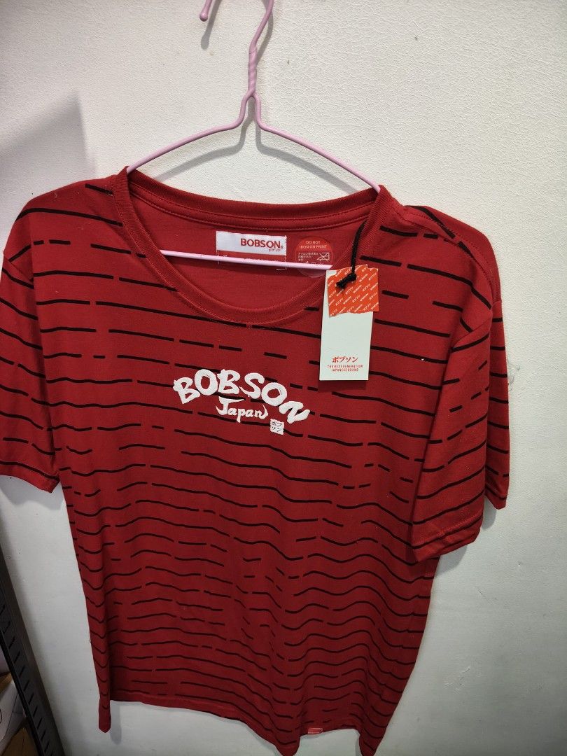Bobson Japan Red Striped T-shirt (Category: Tshirts & Polo Shirts ) located in Victoria. Submitted by reignf027 (Listing ID 1405927408, Image 1). Description: - Red Bobson Japan T-shirt - Black horizontal stripes - Features Bobson Japan logo - Short-sleeved - Includes original tag.