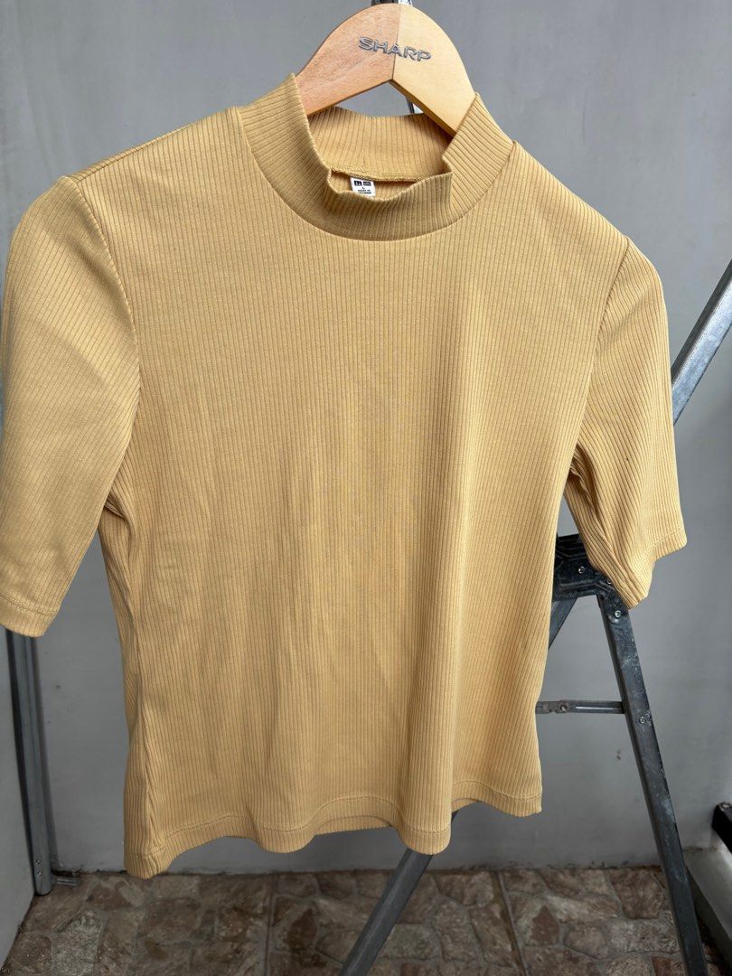 Bundle Uniqlo Ribbed Tops (Category: Shirts) located in Marikina City. Submitted by decluttering__E (Listing ID 1405913624, Image 3). Description: - Uniqlo Ribbed Tops - Size: White Top Medium (M) Yellow Top Large (L) - Includes: - Mustard yellow mock neck top - White top - Features: - Short sleeves.