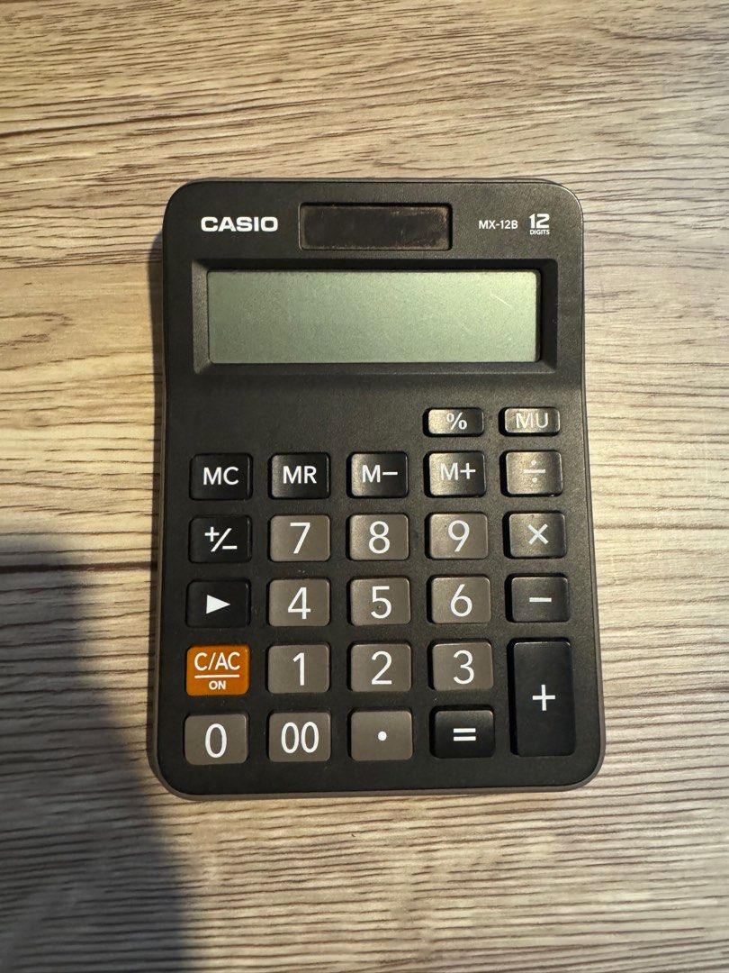 Casio MX-12B Calculator (Category: Office & Business Technology) located in Pasay City. Submitted by mocksteals (Listing ID 1406070161, Image 1). Description: - Negotiable - No box - Casio MX-12B Calculator - 12-digit display - Solar powered and battery operated (LR54) - Basic functions: Percentage, Memory, Square Root - Black body with gray buttons .