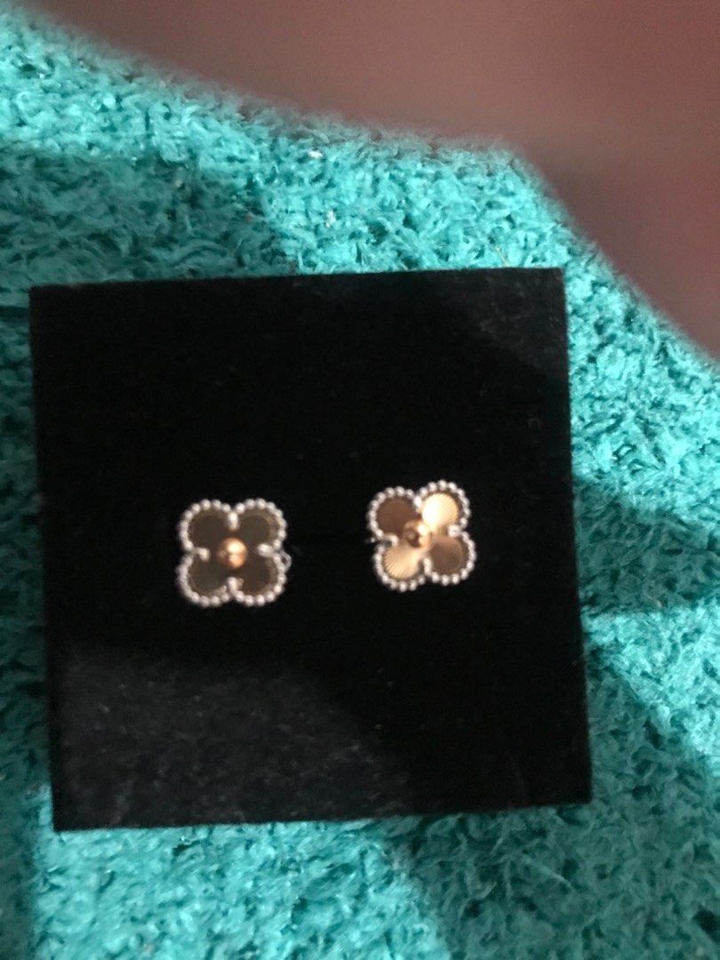 Clover Silver Titanium and Rosegold Clover Earrings (Category: Earrings) located in Cavite. Submitted by ladyrain21 (Listing ID 1406062662, Image 2). Description: Silver Titanium 9mm clover size With engrave on lock and back of earrings.